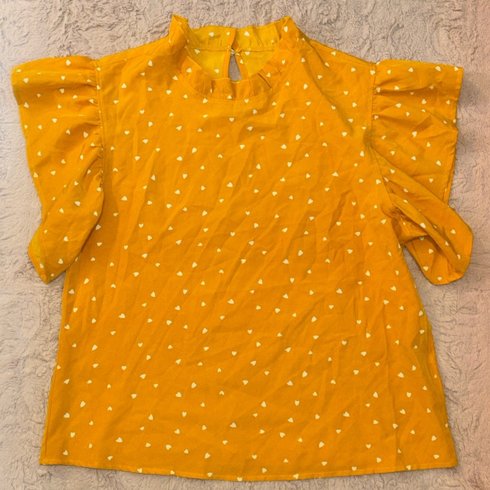 Heart print blouse in size L